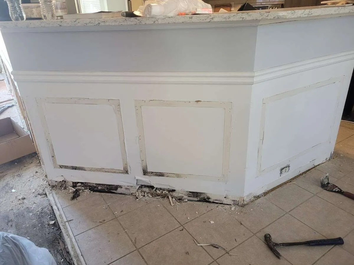Water damage and mold on kitchen during Storm Damage Restoration in Kissimmee